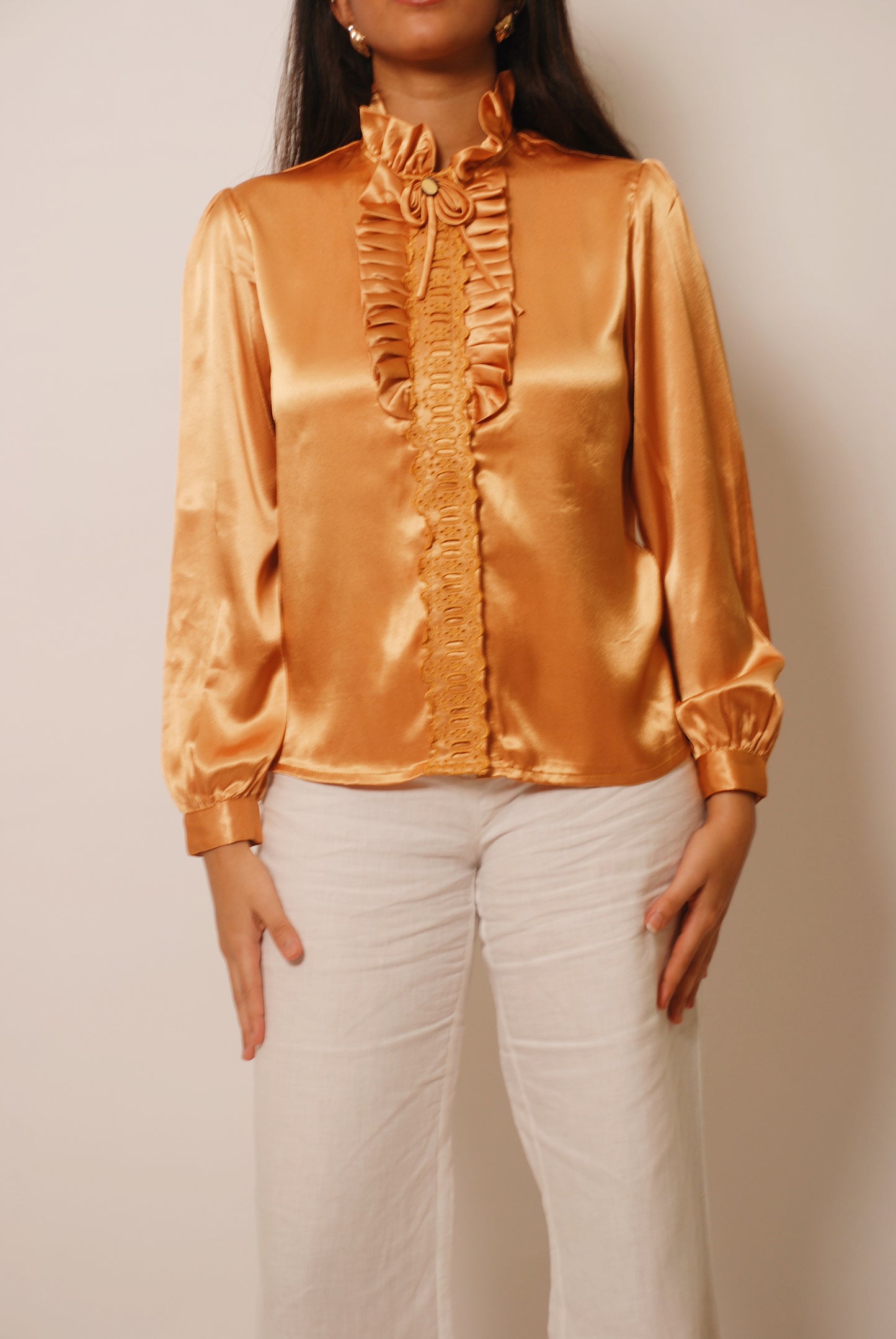 Metallic gold ruffled top