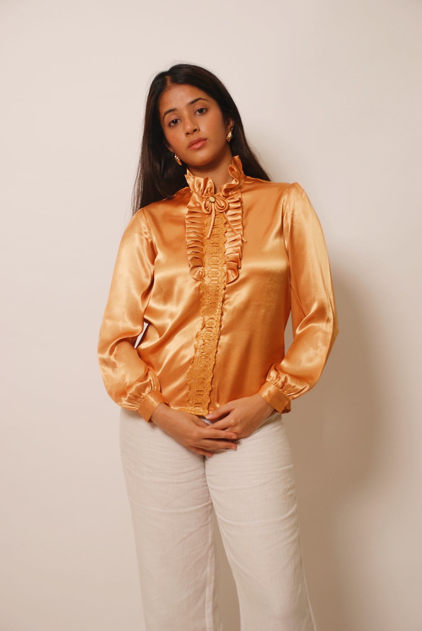 Metallic gold ruffled top