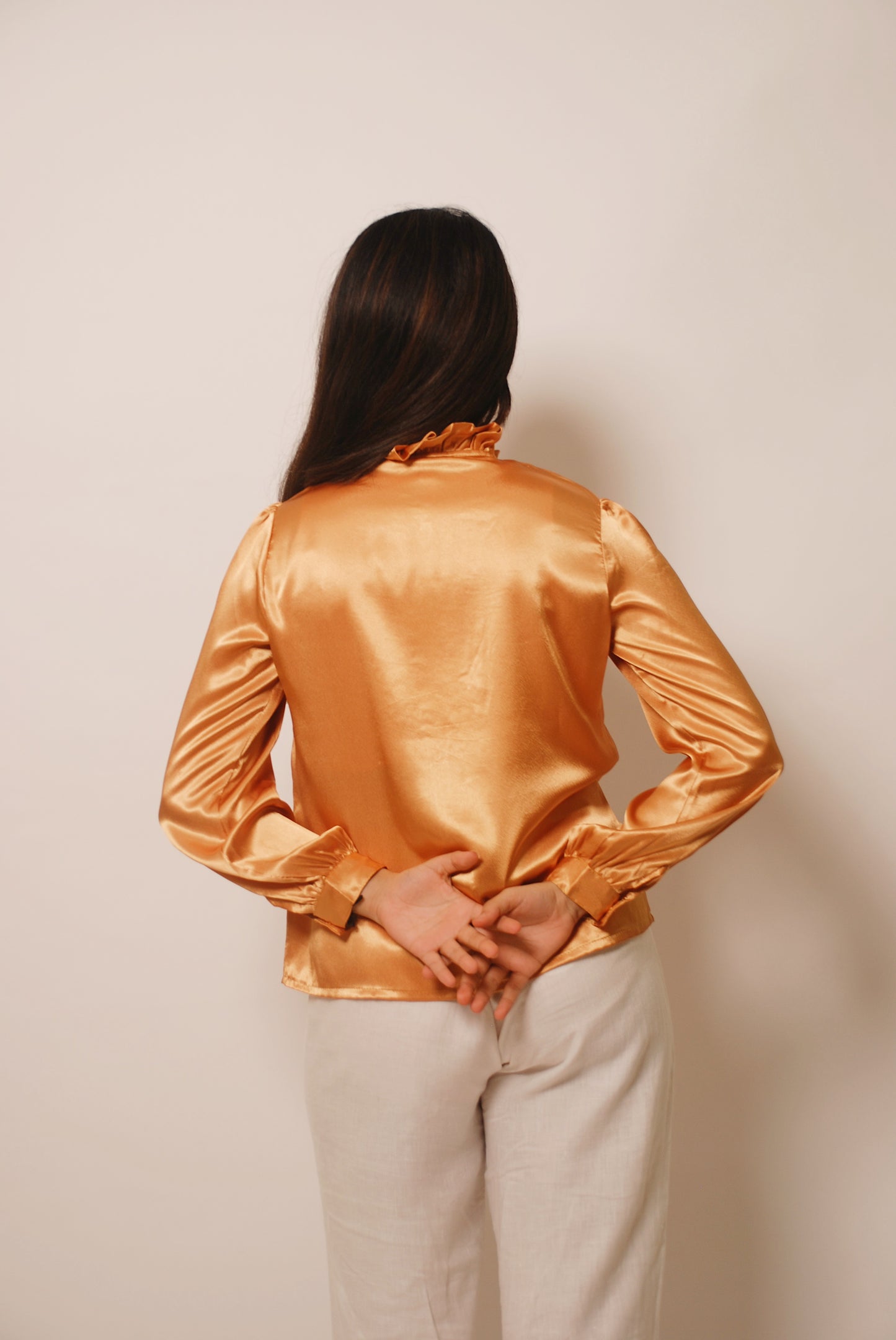 Metallic gold ruffled top