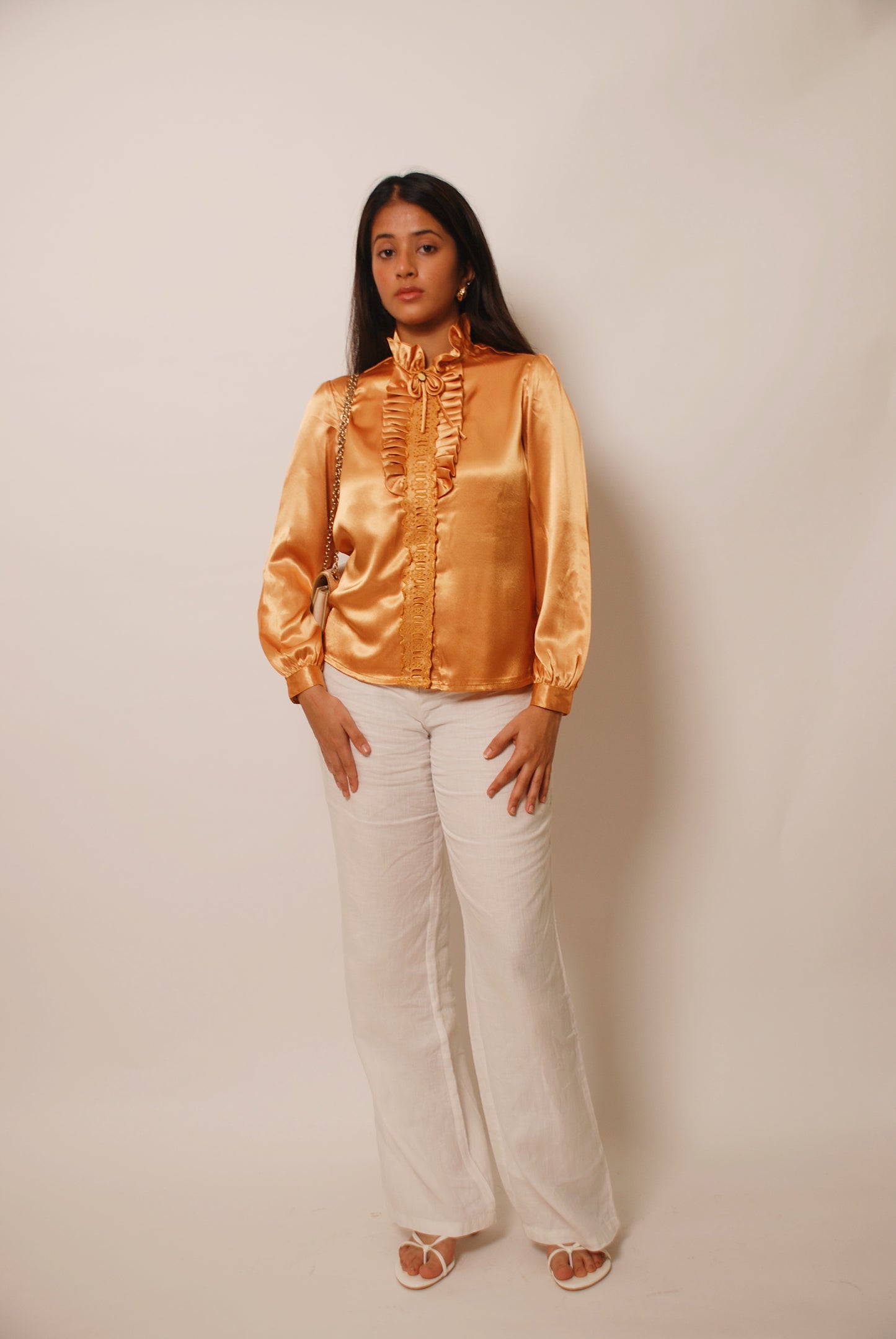 Metallic gold ruffled top