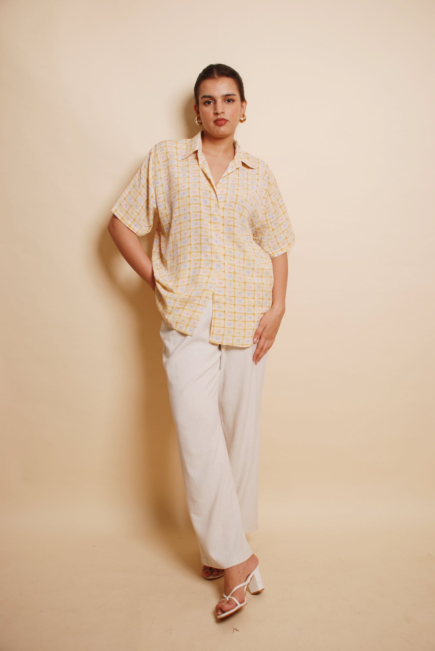 Light yellow floral button-up shirt