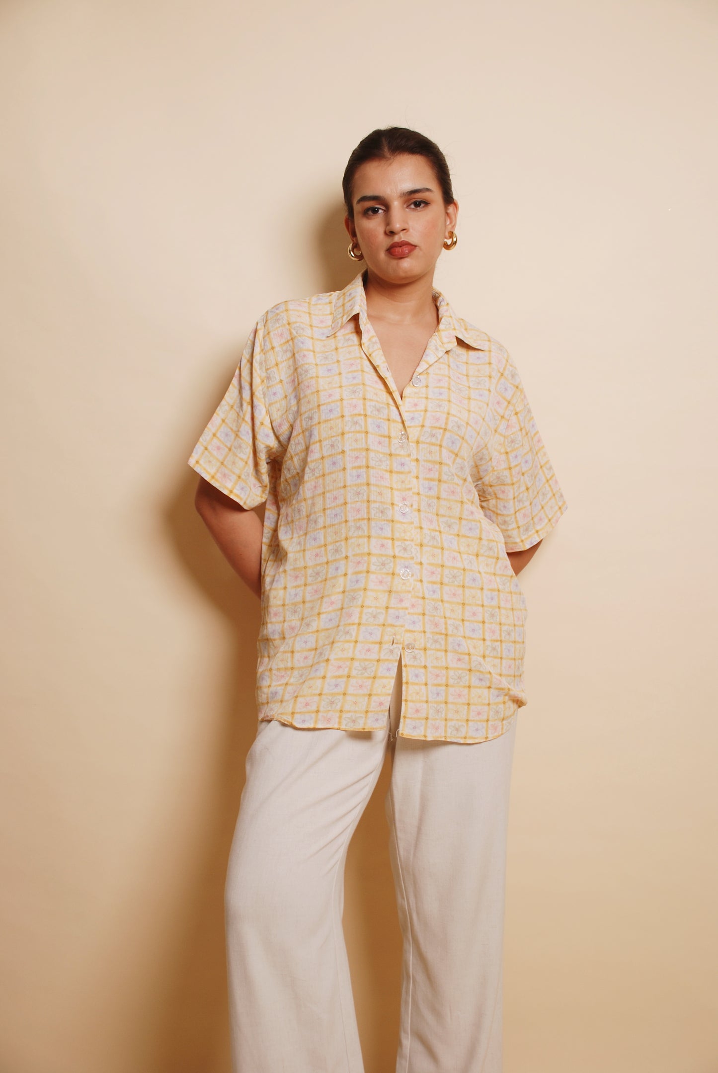 Light yellow floral button-up shirt