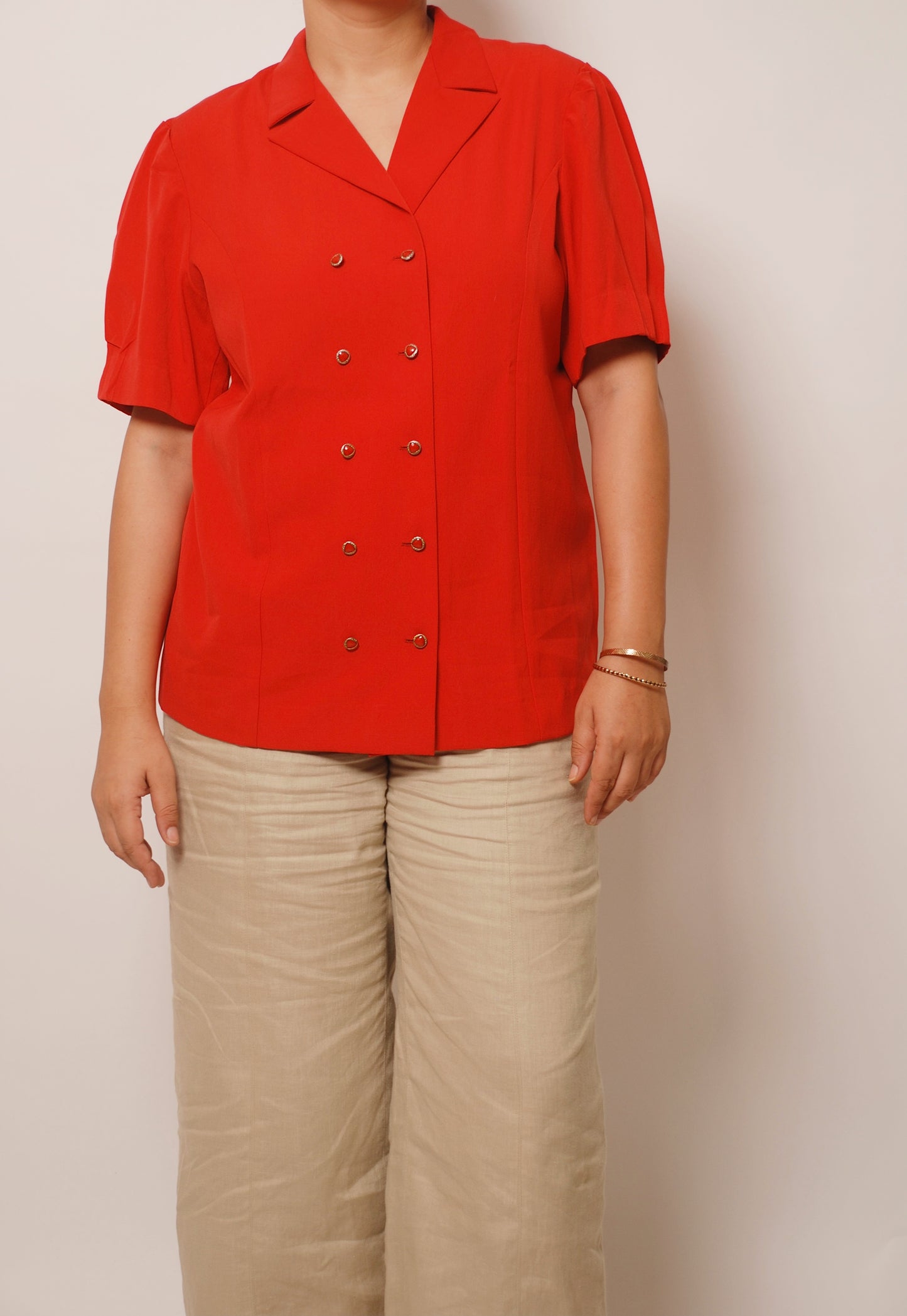 Red double breasted shirt with ornamental buttons