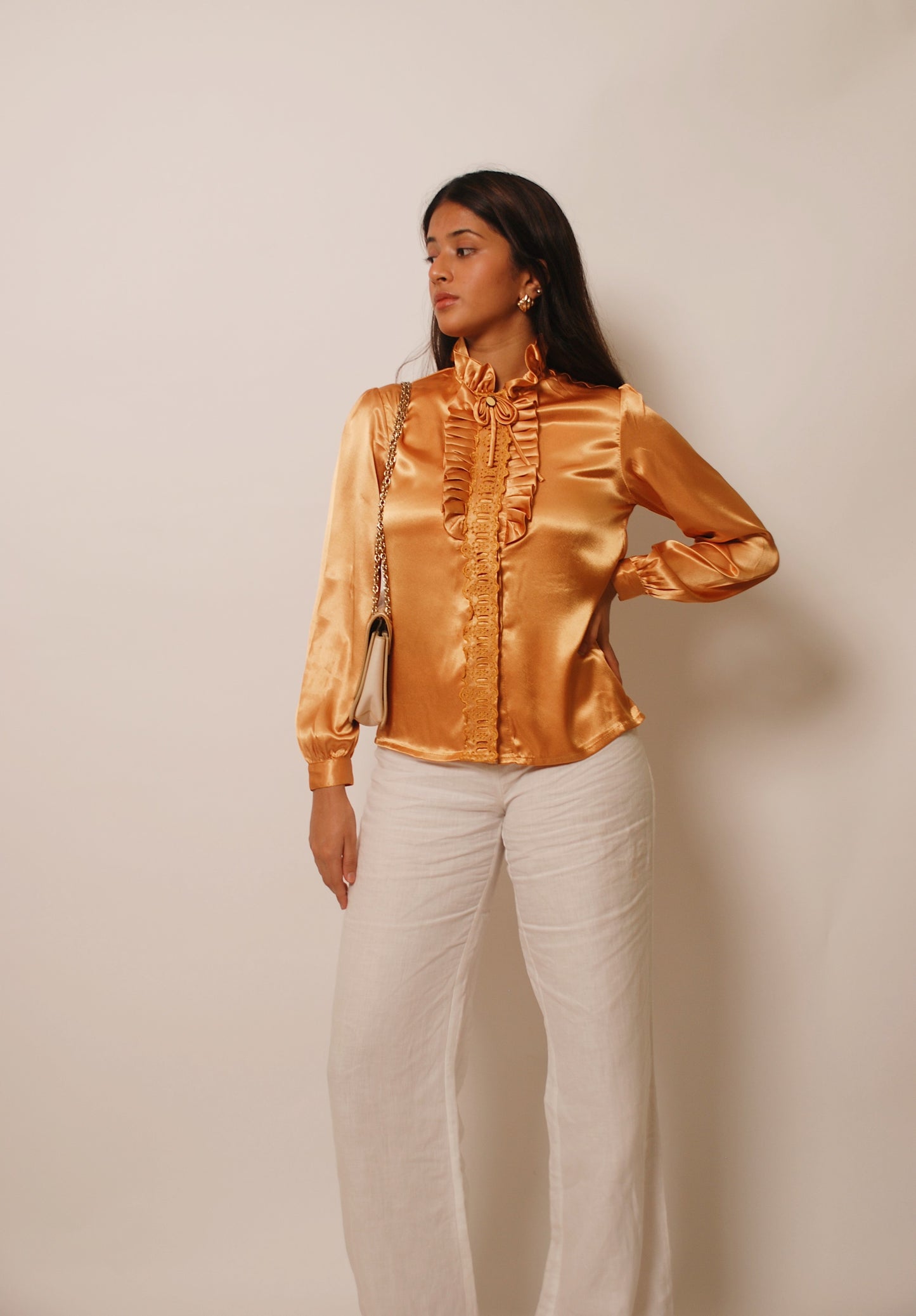 Metallic gold ruffled top