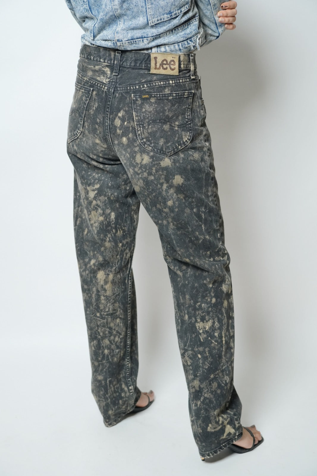 Black acid wash denim