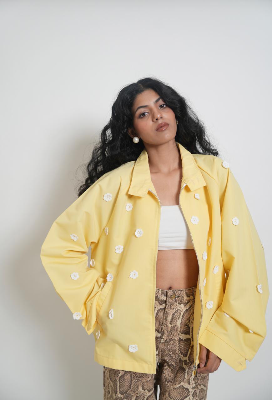 Yellow reworked jacket with crochet flowers