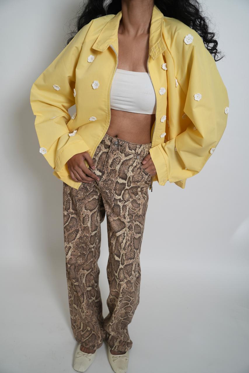 Yellow reworked jacket with crochet flowers