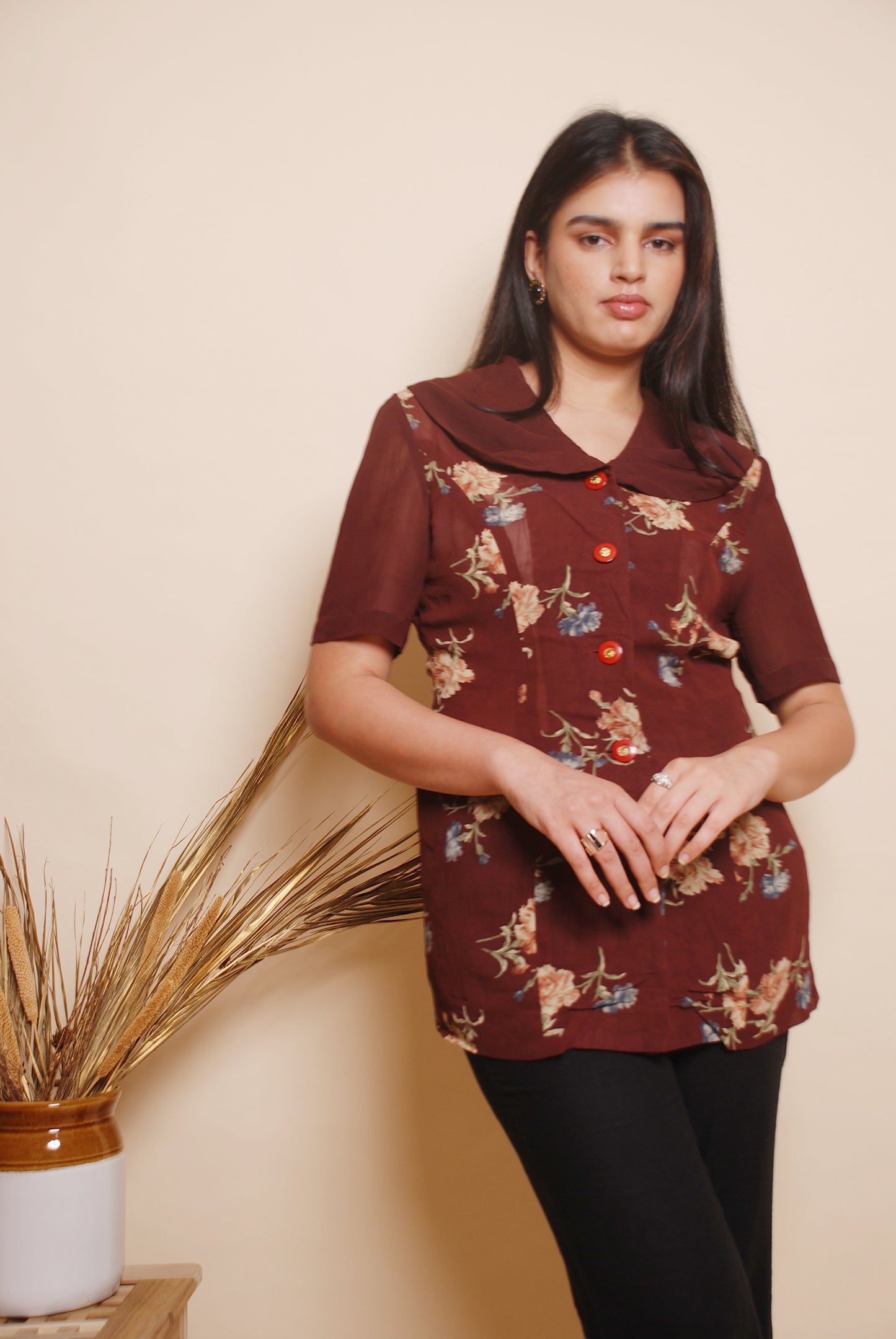 Floral blouse with ornamental buttons