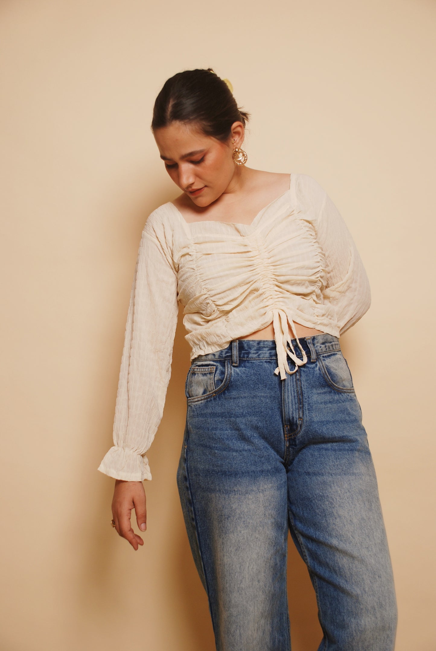 Cream ruched top with drawstring