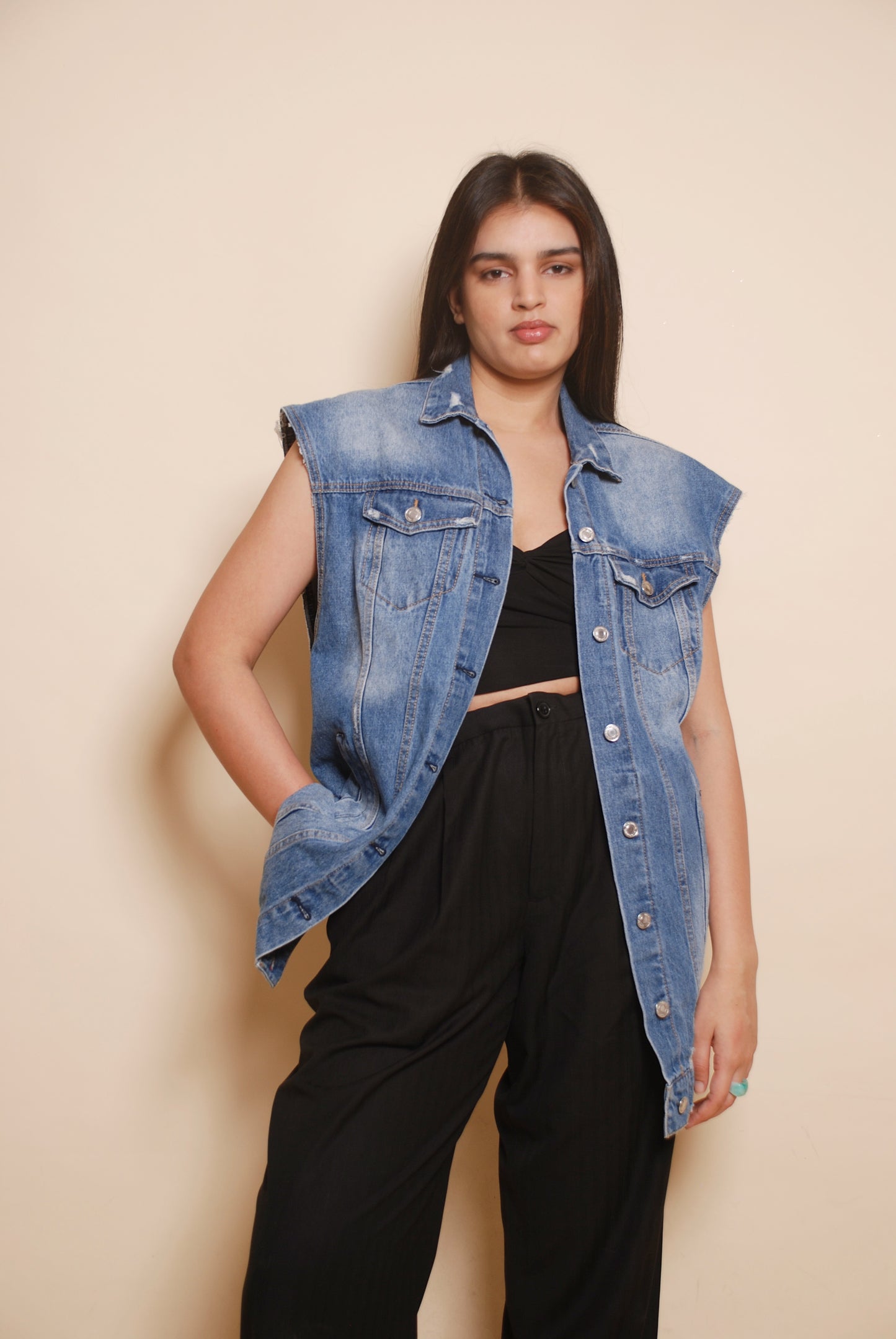 Blue sleeveless denim jacket