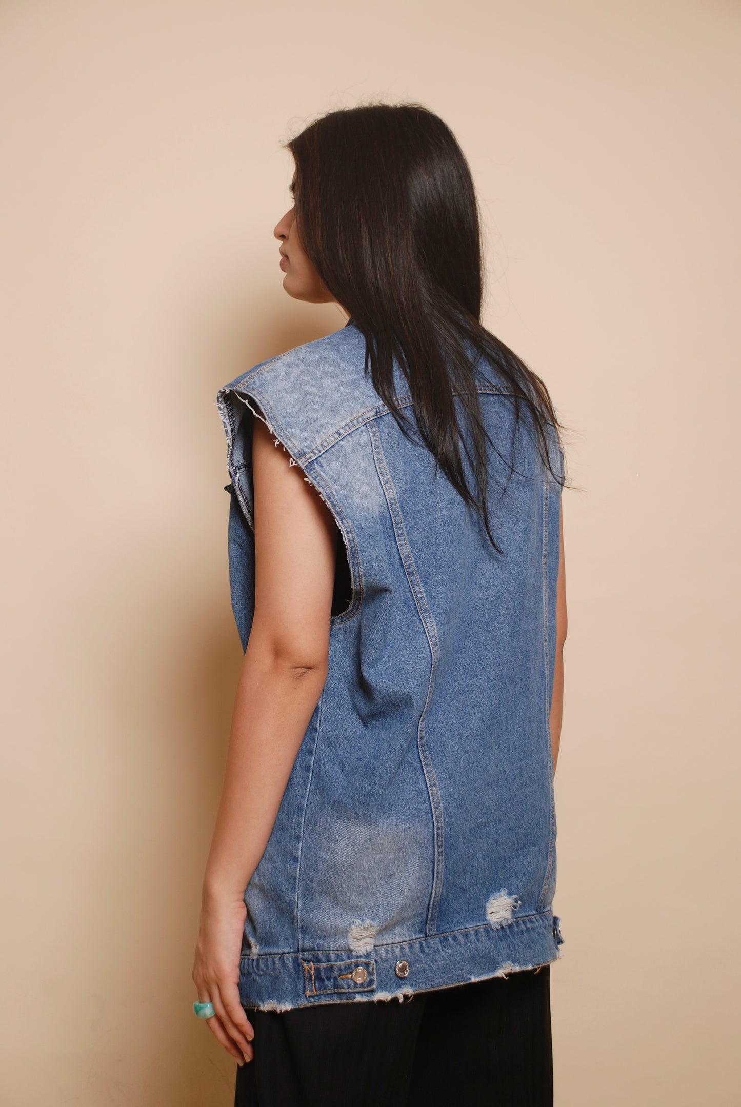 Blue sleeveless denim jacket