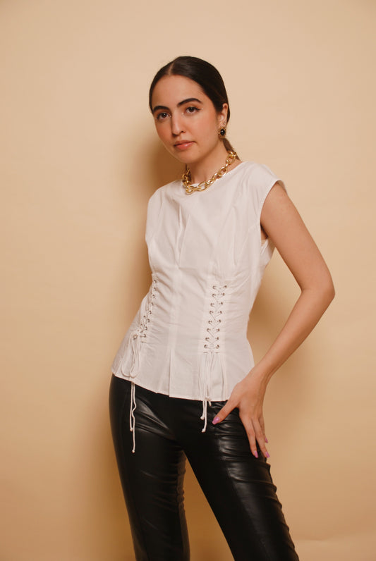 White sleeveless top with lace ups