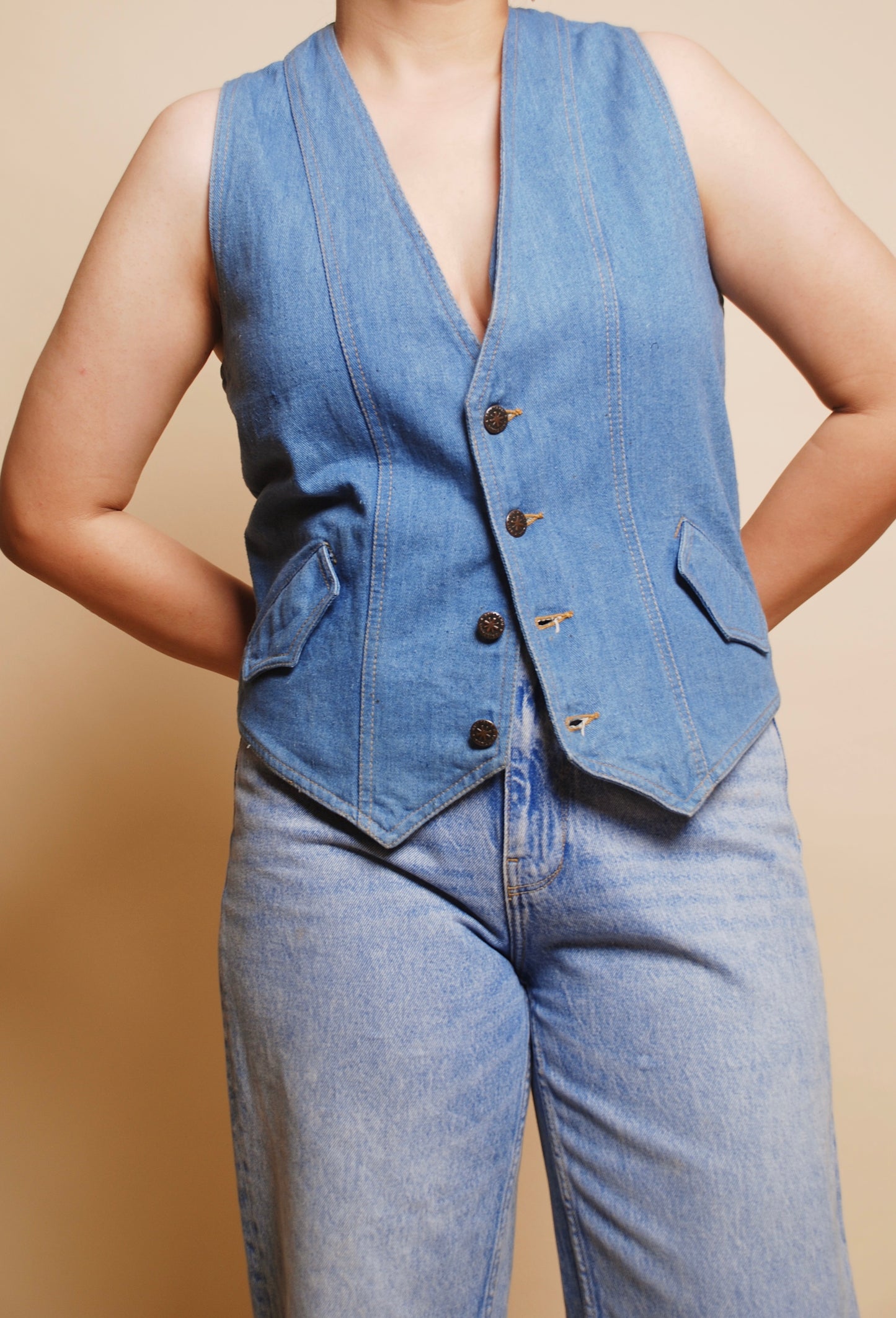 Vintage blue sleeveless denim vest