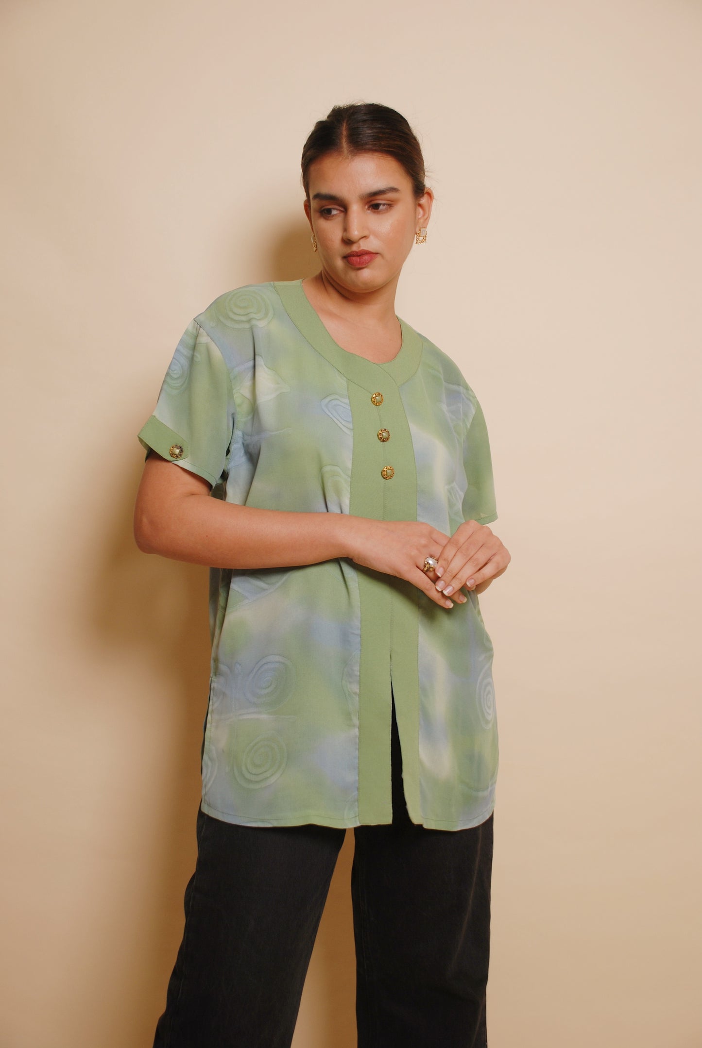 Green u-neck blouse with ornamental buttons