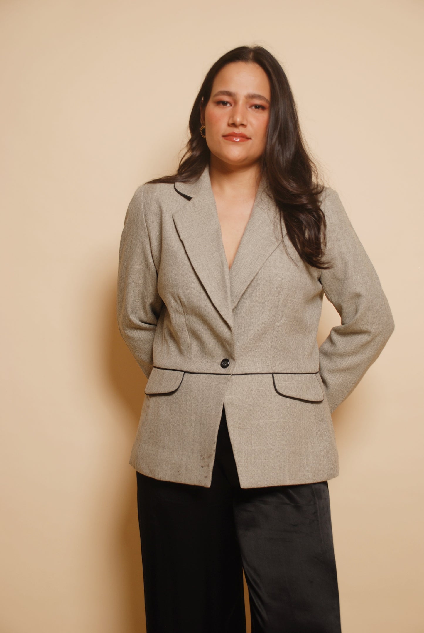 Grey structured blazer with black piping