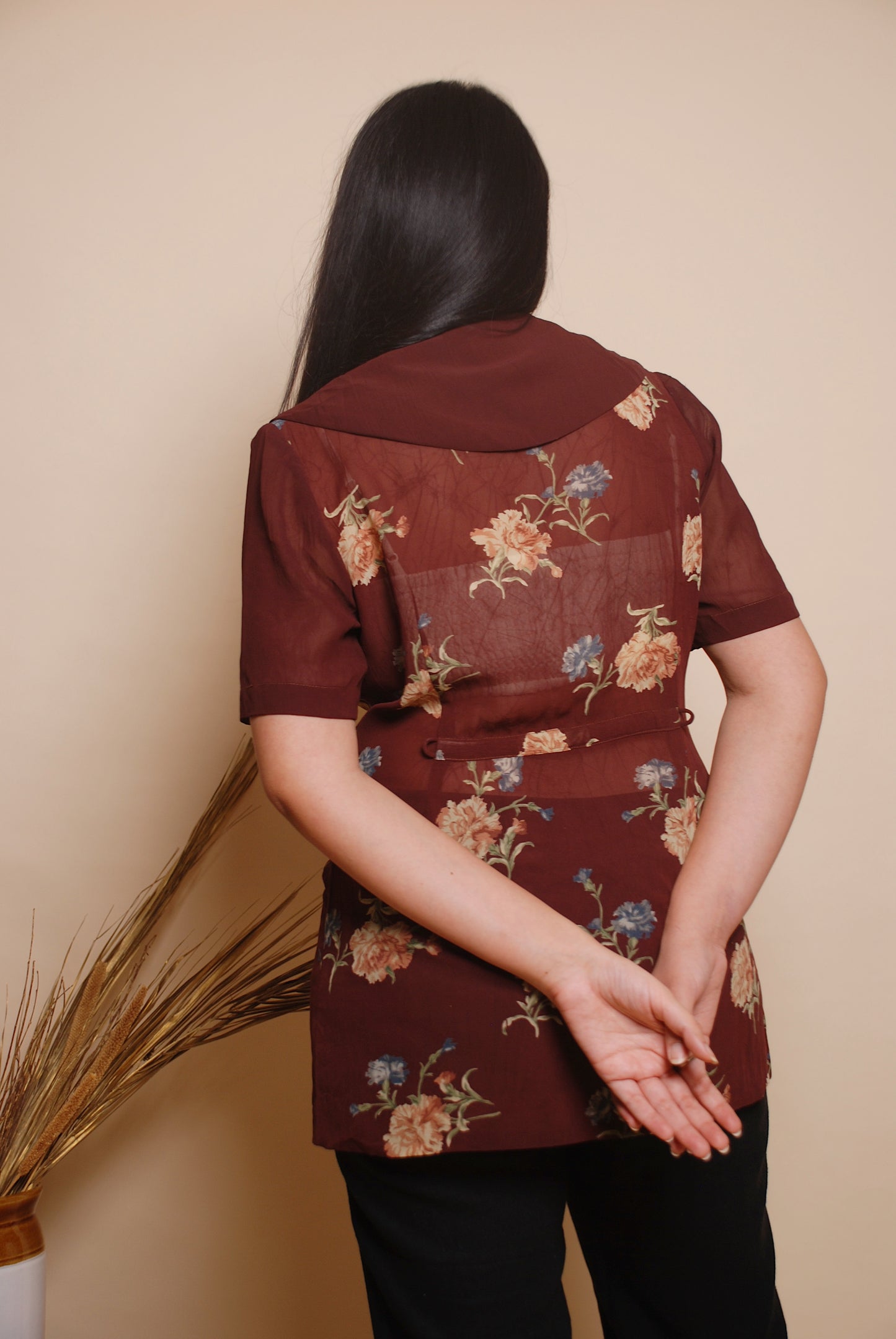 Floral blouse with ornamental buttons