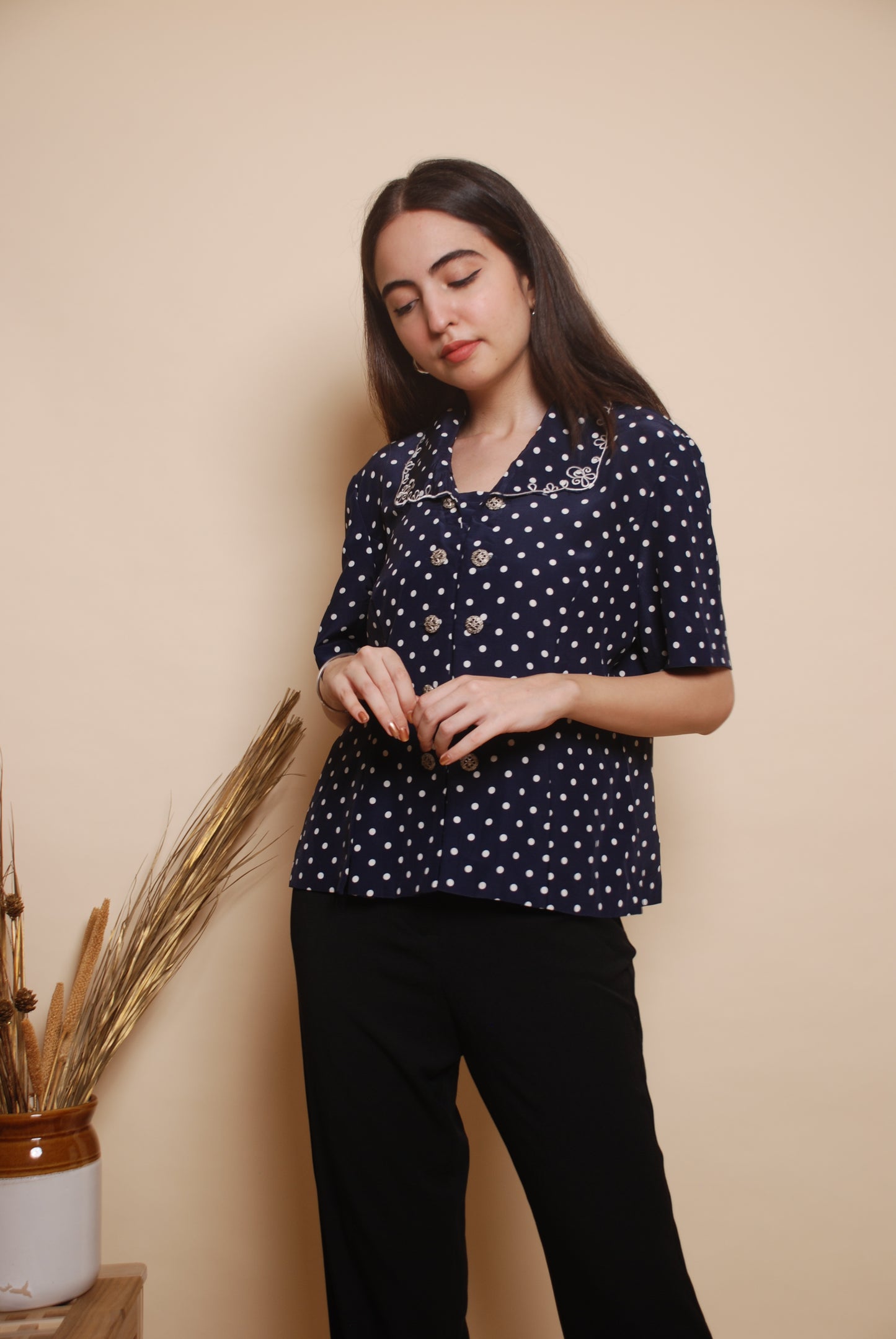 Blue polka dot shirt with embroidered collar