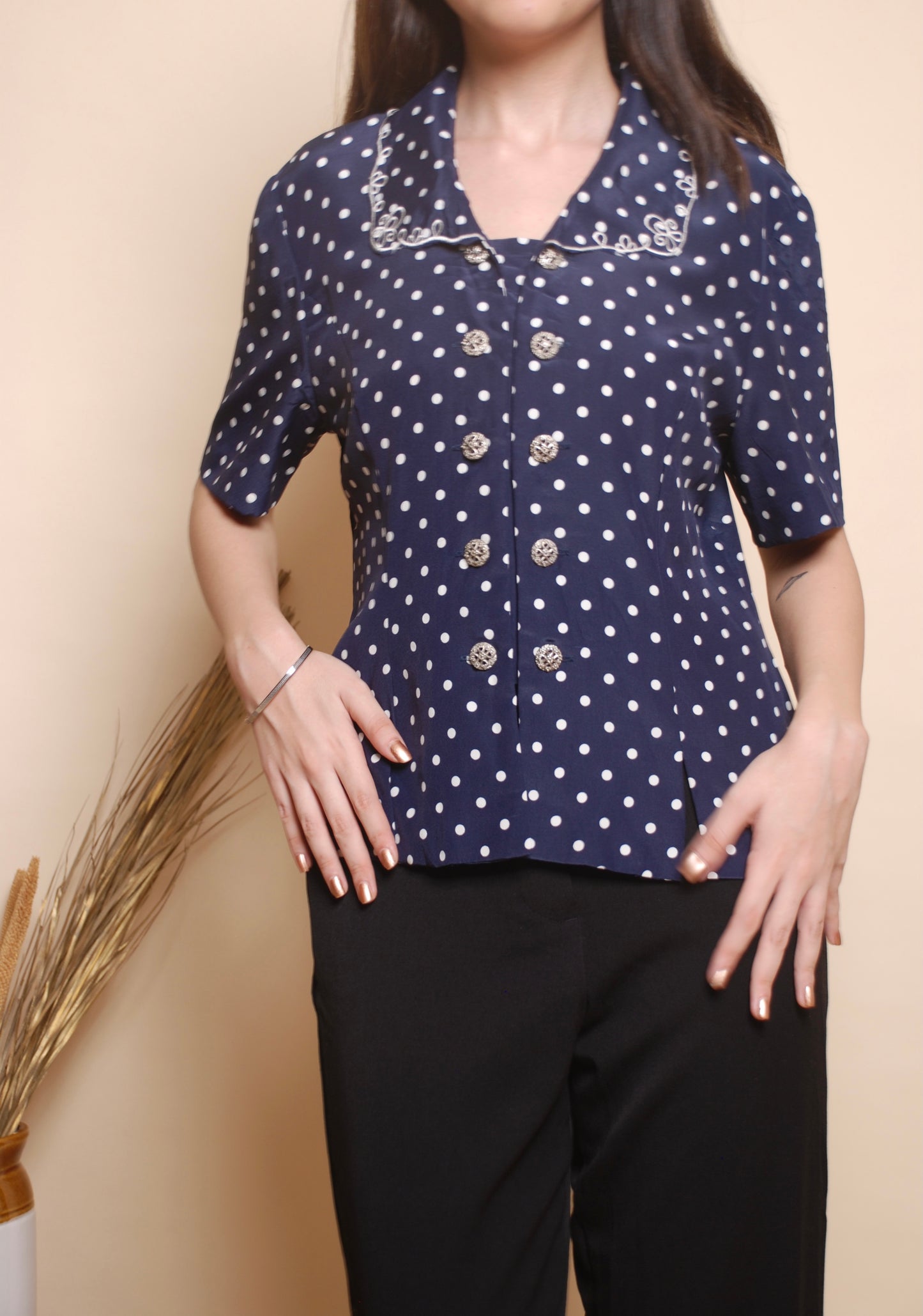 Blue polka dot shirt with embroidered collar