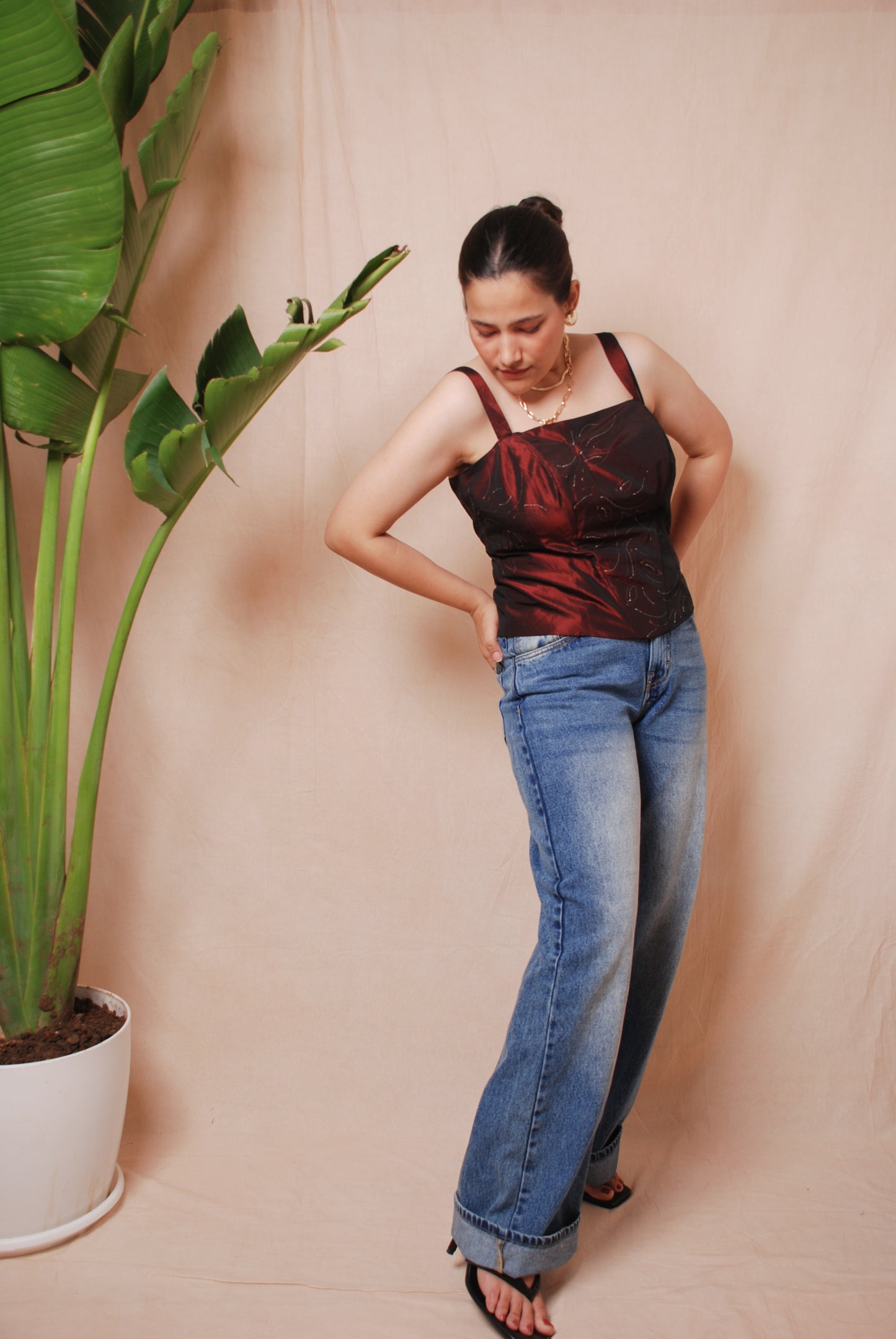 Maroon corset top with sequin floral detailing