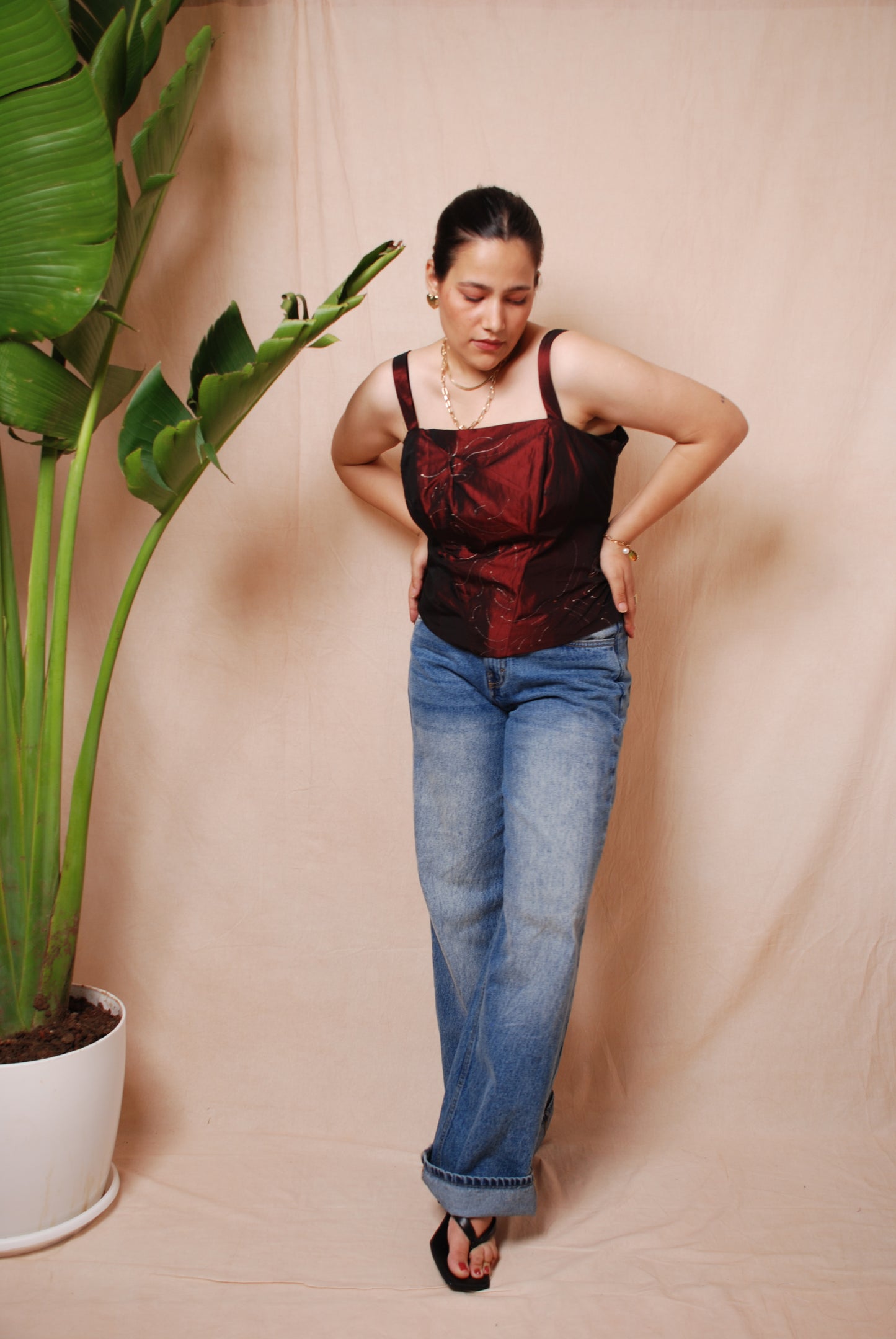 Maroon corset top with sequin floral detailing