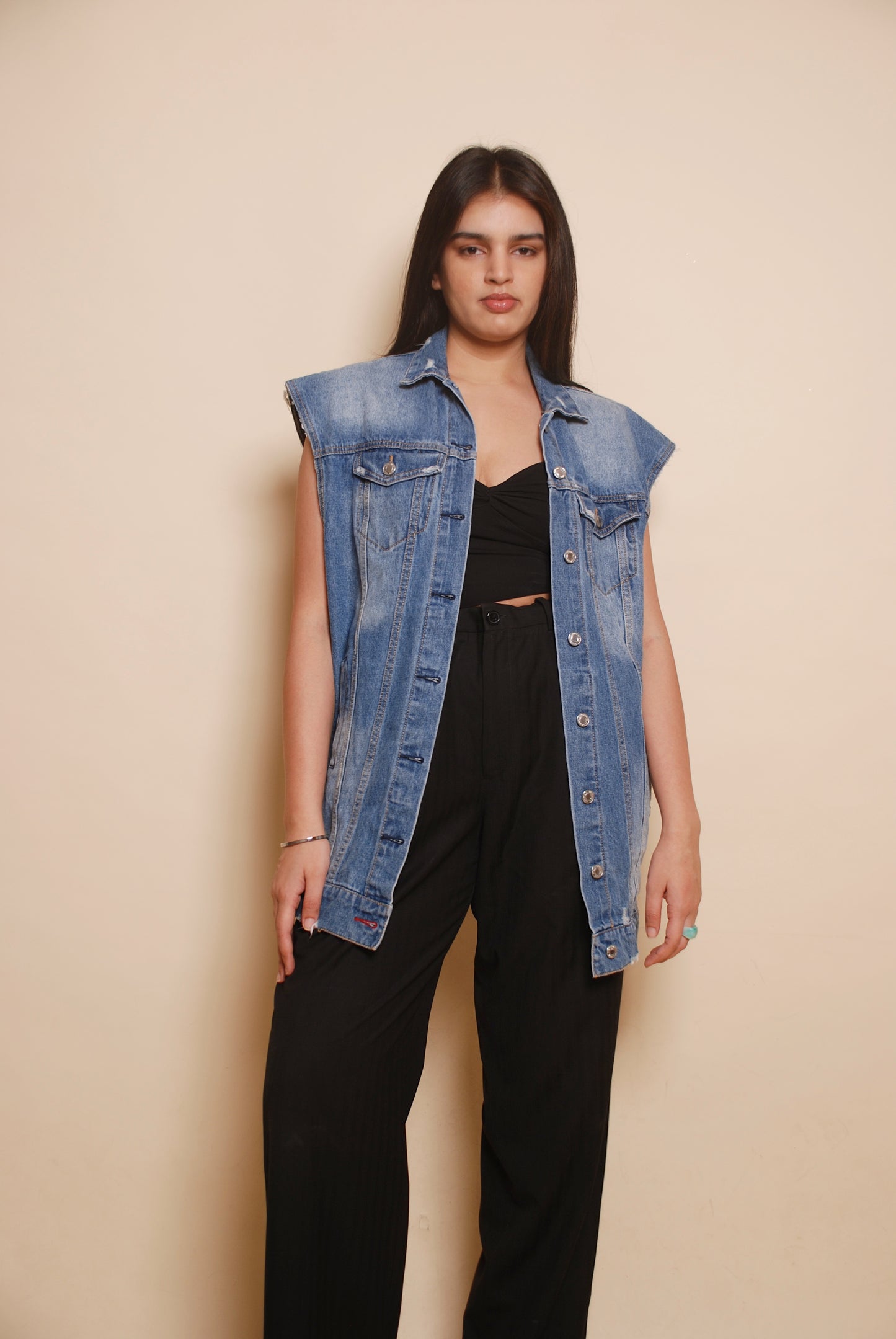 Blue sleeveless denim jacket